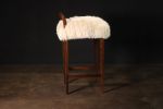 Exotic Wood Stool in Sheepskin by Costantini, Umberto | Chairs by Costantini Designñ. Item composed of wood and fabric