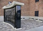 McPherson Globe Refiners monument | Public Sculptures by Sutton Betti | McPherson Community Building in McPherson