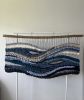 Large Handwoven Wall Tapestry "Breath of the Ocean" | Wall Sculpture in Wall Hangings by Tissage Sauvage. Item composed of wood and cotton in boho or contemporary style