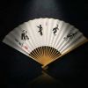 Bespoke Chinese Calligraphy Jade-Finish Bamboo Folding Fan | Mixed Media in Paintings by Dynasty Artisan. Item made of bamboo with paper works with minimalism & eclectic & maximalism style