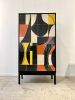 Bossa Armoire by Morgan Clayhall – Mixed Media Art on Doors | Cabinet in Storage by Morgan Clayhall. Item made of walnut & steel