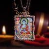 Handcrafted Medicine Buddha Thangka Amulet Pendant Art | Ornament in Decorative Objects by Dynasty Artisan. Item composed of metal in contemporary or eclectic & maximalism style