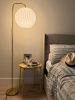 Gold floor lamp with a pleated round lampshade, globe shade | Lamps by Studio Pleat. Item composed of brass and paper in minimalism or contemporary style