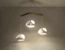 Claylight Double Cut Boomerang | Chandeliers by lightexture. Item made of wood with ceramic