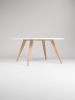 FINN 4 - White round coffee table, with solid oak legs | Tables by Mo Woodwork | Stalowa Wola in Stalowa Wola. Item made of oak wood works with minimalism & mid century modern style