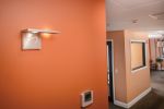 Edge Sconce | Sconces by ILEX Architectural Lighting | ARCH Orthodontics in Westwood. Item made of wood with glass