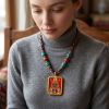 Handcrafted Zha Ji Lhamo Dzambala Thangka Pendant Art | Ornament in Decorative Objects by Dynasty Artisan. Item made of metal works with contemporary & eclectic & maximalism style