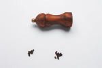 Walnut Pepper Mill with Gold Accent – Hand‑Turned | Placemat in Tableware by Holzkunst Samuel Meisinger. Item made of walnut with brass works with art deco & modern style