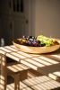 Hand-carved Shallow Ash Wood Fruit Bowl | Serving Bowl in Serveware by Creating Comfort Lab | Los Angeles in Los Angeles. Item composed of wood