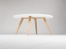 FINN 4 - White round coffee table, with solid oak legs | Tables by Mo Woodwork | Stalowa Wola in Stalowa Wola. Item made of oak wood works with minimalism & mid century modern style