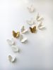 Set of 11 Gold & White Porcelain Ceramic Butterflies | Wall Sculpture in Wall Hangings by Elizabeth Prince Ceramics. Item composed of stoneware in minimalism or contemporary style