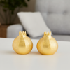 Pomegranate Salt & Pepper Shaker Set of 2 – Gold Finish | Cutlery in Utensils by Serein Wellness LLC. Item made of aluminum compatible with boho and art deco style