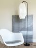 Gold floor lamp with a pleated oval long lampshade | Lamps by Studio Pleat. Item made of aluminum with paper works with minimalism & contemporary style