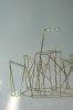 Ossature | Sconces by Ombre Portée | Le Plan B - Lyon Brotteaux in Lyon. Item made of brass