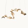 Dune 10 Curve in Metallic Tones Pendant Light | Chandeliers by MOSS Objects. Item made of metal works with contemporary & japandi style