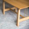 Coffee table | Tables by Majid Lavasani. Item made of oak wood & brass