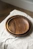 Hand Carved Walnut Wood Plate | Dinnerware by Creating Comfort Lab. Item composed of walnut