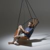 Studio Stirling Angular Sling | Swing Chair in Chairs by Studio Stirling. Item made of steel & leather