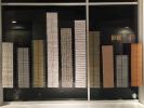 Handwoven with metal heddles: Cityscape | Wall Sculpture in Wall Hangings by Doerte Weber | Cinnabar Art Gallery in San Antonio. Item composed of metal and fiber