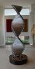 "Twist of Fate" | Sculptures by Brian Schader. Item made of steel with stone