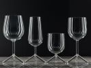 Mix set 4 different tripod glasses | Drinkware by Maarten Baptist. Item made of glass works with contemporary & modern style