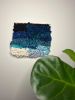 Jitesh 1 - Bittersweet Lily Woven Wall Hanging: Handmade Fiber Art | Candle Holder in Decorative Objects by Arsallan S