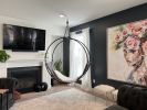 Wheel Hanging Daybed in Pittsburg Pennsylvania Private Home | Hammock in Chairs by Studio Stirling. Item made of steel works with boho & minimalism style