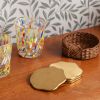 Wavy Brass Coasters with Rattan Holder (set of four) | Tableware by Hastshilp