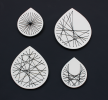 4 Stitched Set of Geometric Ceramics | Wall Sculpture in Wall Hangings by Elizabeth Prince Ceramics. Item made of ceramic works with mid century modern & contemporary style
