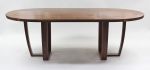 Oval walnut table, Trapeze leg, with book-matched top. | Dining Table in Tables by Jonathan Field. Item composed of walnut