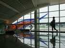 Celestial Passage blown glass wall | Glasswork in Wall Treatments by Guy Kemper | Baltimore/Washington International Thurgood Marshall Airport in Baltimore. Item composed of synthetic
