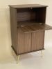 Modern Bar Cabinet | Storage by Fox Farm Design Build. Item made of walnut compatible with boho and mid century modern style