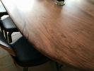 Oval 'Pebble Edged' Walnut Table on Black Waxed Steel Legs | Dining Table in Tables by Jonathan Field. Item composed of walnut and steel