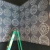 Whitman's Manhole | Wallpaper in Wall Treatments by Merenda Wallpaper | Whitman's in New York. Item made of paper