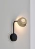 Olo Wu Wall Sconce | Sconces by SEED Design USA. Item composed of brass