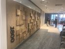 Wood Founders Wall- Wood Wall Sculpture | Paneling in Wall Treatments by Scott Troxel Art | PricewaterhouseCoopers LLP in New York. Item composed of oak wood