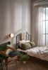 Pensee Wall Sconce | Sconces by SEED Design USA. Item composed of brass and glass