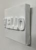 Hello | Signage by Emeline Tate. Item composed of canvas