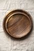 Hand Carved Walnut Wood Plate | Dinnerware by Creating Comfort Lab. Item composed of walnut