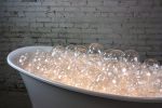 Buoyancy Bubble Bath | Chandeliers by Neptune Glassworks. Item composed of brass and glass