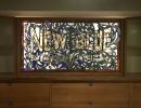 New Blue Construction Signage | Signage by Soda Ash & Sand | New Blue Construction in Chattanooga. Item composed of glass