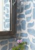 Metolius Chatty Azurite Blue Wallpaper | Wall Treatments by Metolius. Item composed of fabric & paper