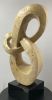 Lover's Knot | Sculptures by Scott Gentry Sculpture, LLC. Item composed of stone in contemporary style