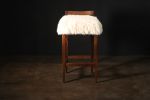 Exotic Wood Stool in Sheepskin by Costantini, Umberto | Chairs by Costantini Design. Item composed of wood and fabric
