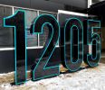 West Quarter Development | Signage by Jones Sign Company. Item made of metal