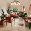 Tona Eternal Milk Glass Chandelier | Chandeliers by Atrix Lighting | Los Angeles in Los Angeles. Item composed of steel and glass