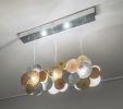 Limpets Bar 3 | Pendants by F+M FOS - Anna Maria Fragiskos Bitros. Item composed of wood and metal