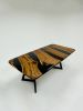 Black Olive Wood Epoxy Resin River Dinner Table - Live Edge | Dining Table in Tables by Tinella Collection. Item composed of wood & brass compatible with minimalism and art deco style