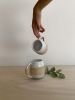 Handmade Ceramic Mug in Mat White and Speckles | Cups by mynt. Item composed of stoneware in boho or minimalism style