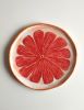 Pink Grapefruit Platter 27 cm | Serveware by Federica Massimi Ceramics. Item composed of ceramic in eclectic & maximalism or mediterranean style